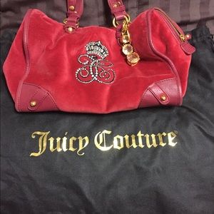 Red Juicy Couture with removable key chain.